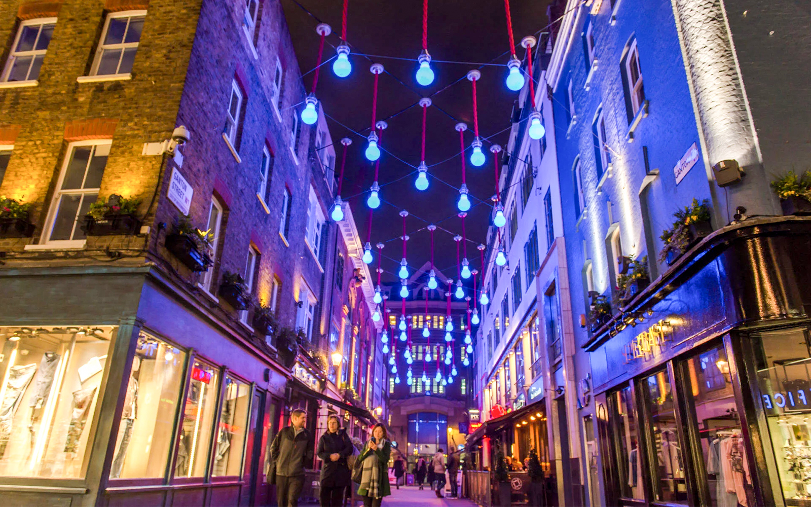 Soho street with blue lights during the Eating London: Twilight Soho Food & Drinks Tour.
