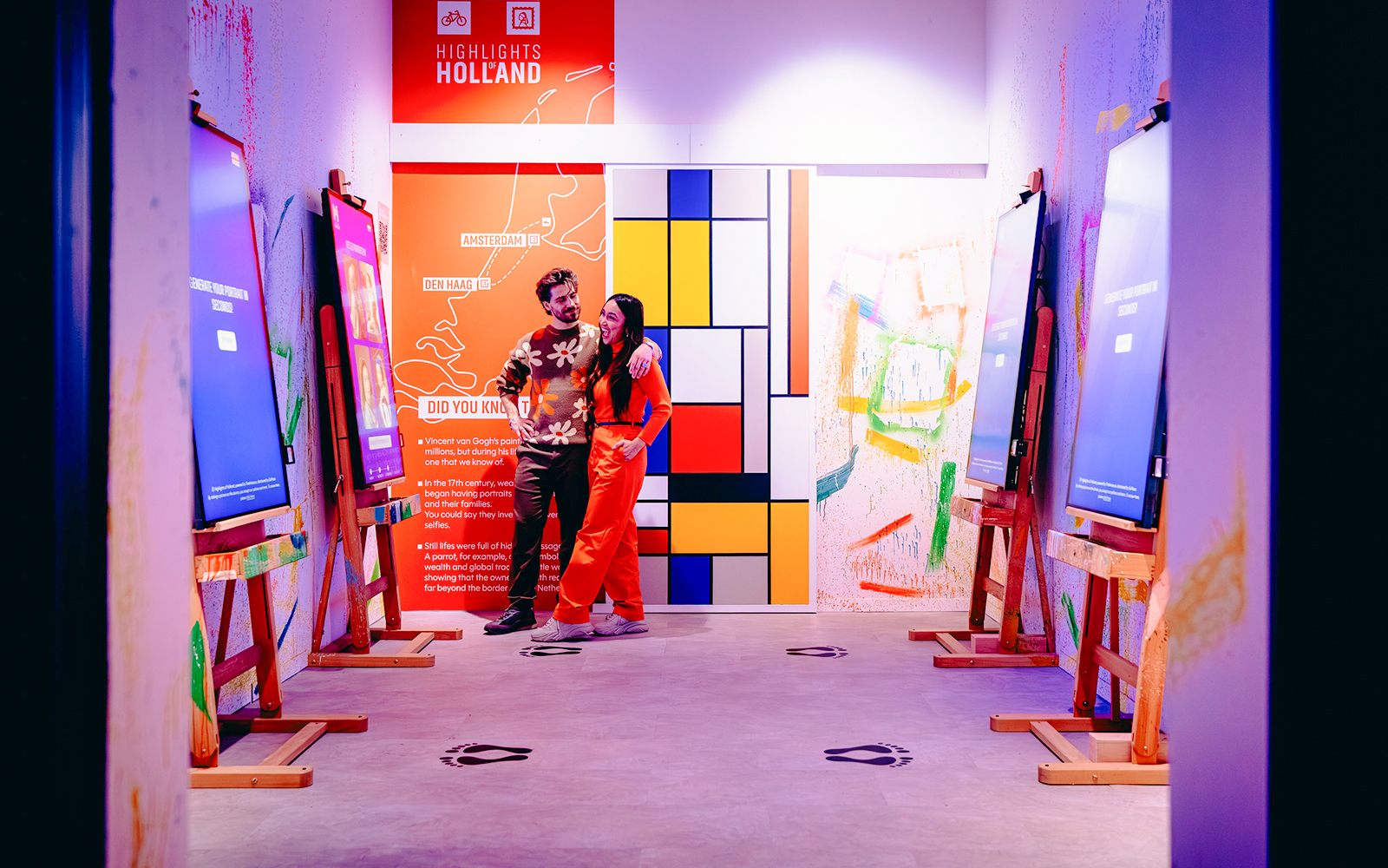 Guests enjoying interactive art displays at Highlights of Holland exhibit.