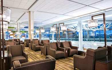 Plaza Premium Lounge seating area at Vancouver International Airport (YVR) Domestic Departures.