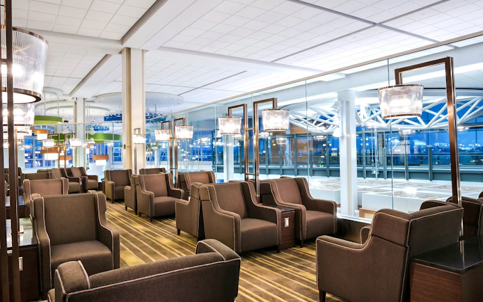 Plaza Premium Lounge seating area at Vancouver International Airport (YVR) Domestic Departures.