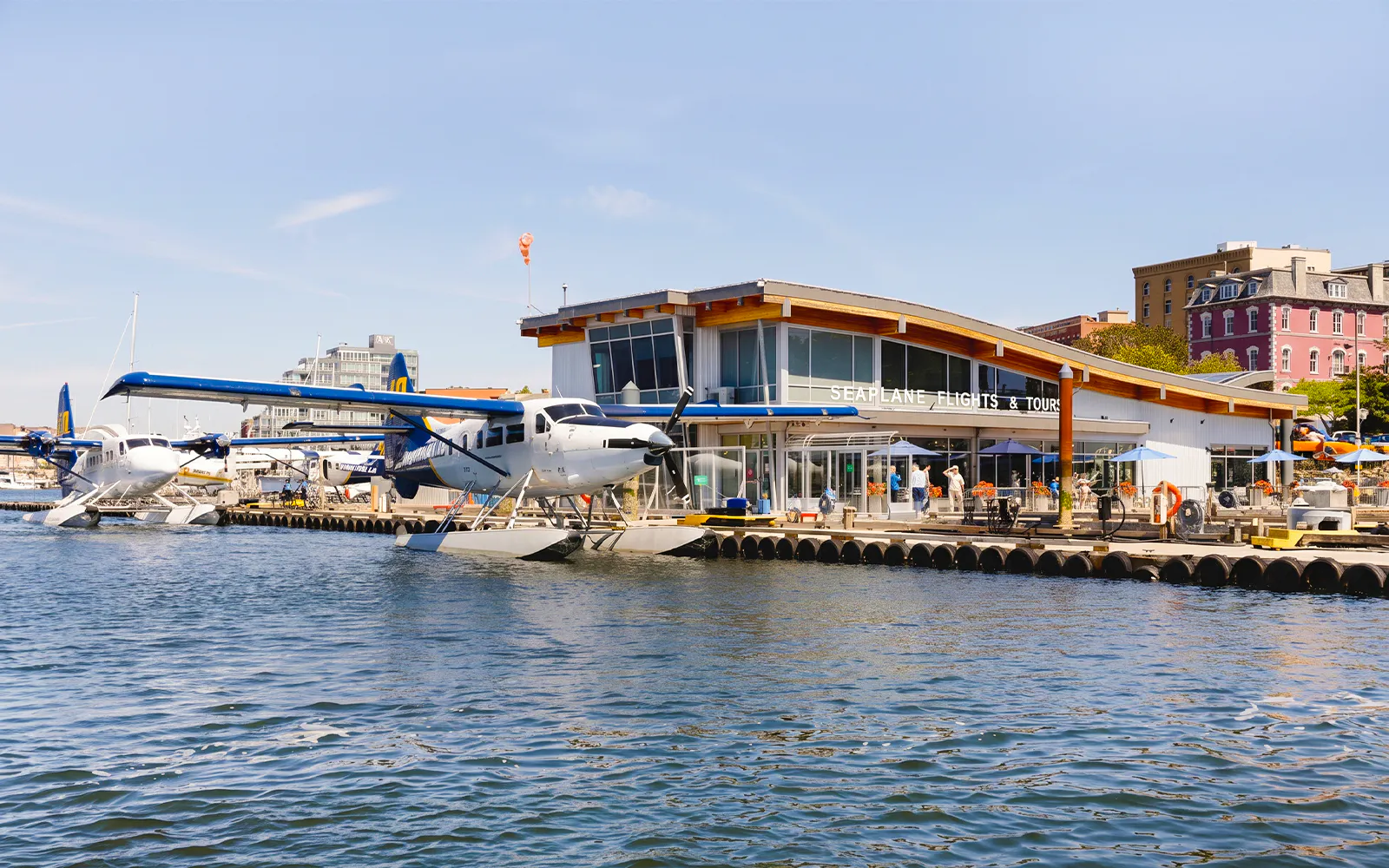 Seaplane docked at terminal, ready for Harbour Air tour departure.