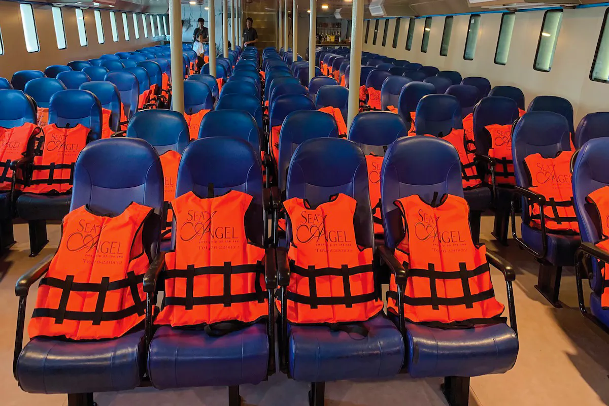 Ferry seating with life jackets for Phuket to Phi Phi transfer.