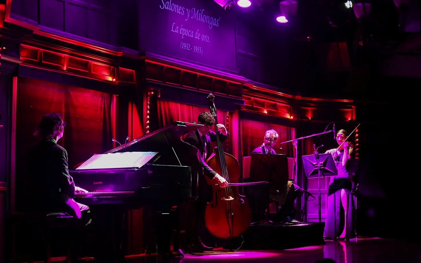 Musicians performing live at El Querandí Tango Show in Buenos Aires.