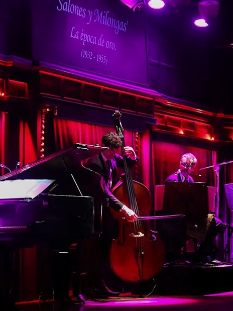 Musicians performing live at El Querandí Tango Show in Buenos Aires.