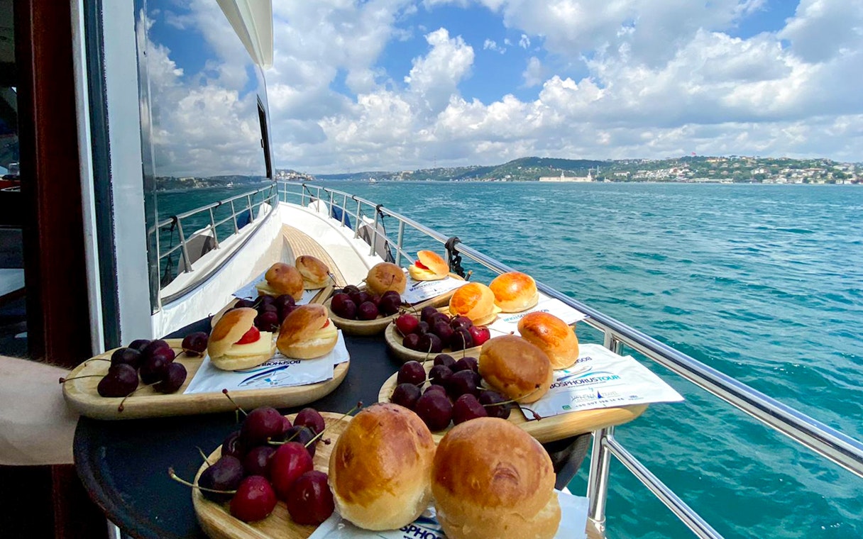 Pastries and cherries on a tray aboard a boat cruising the Bosphorus in Istanbul.
