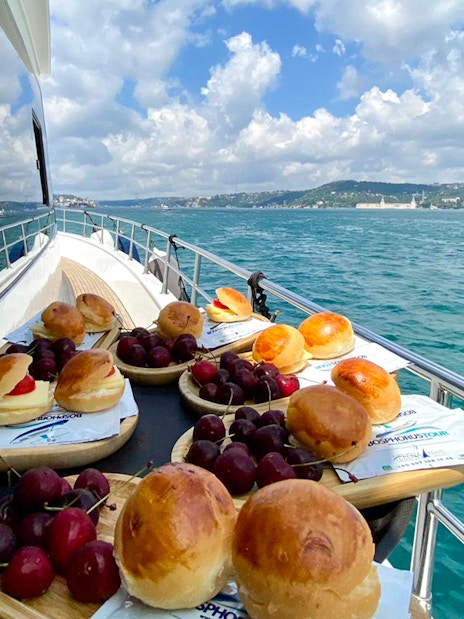 Pastries and cherries on a tray aboard a boat cruising the Bosphorus in Istanbul.