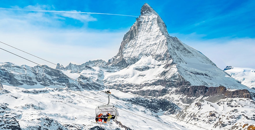 Matterhorn Glacier Paradise cable car with snow-covered peaks in Zermatt, Switzerland.