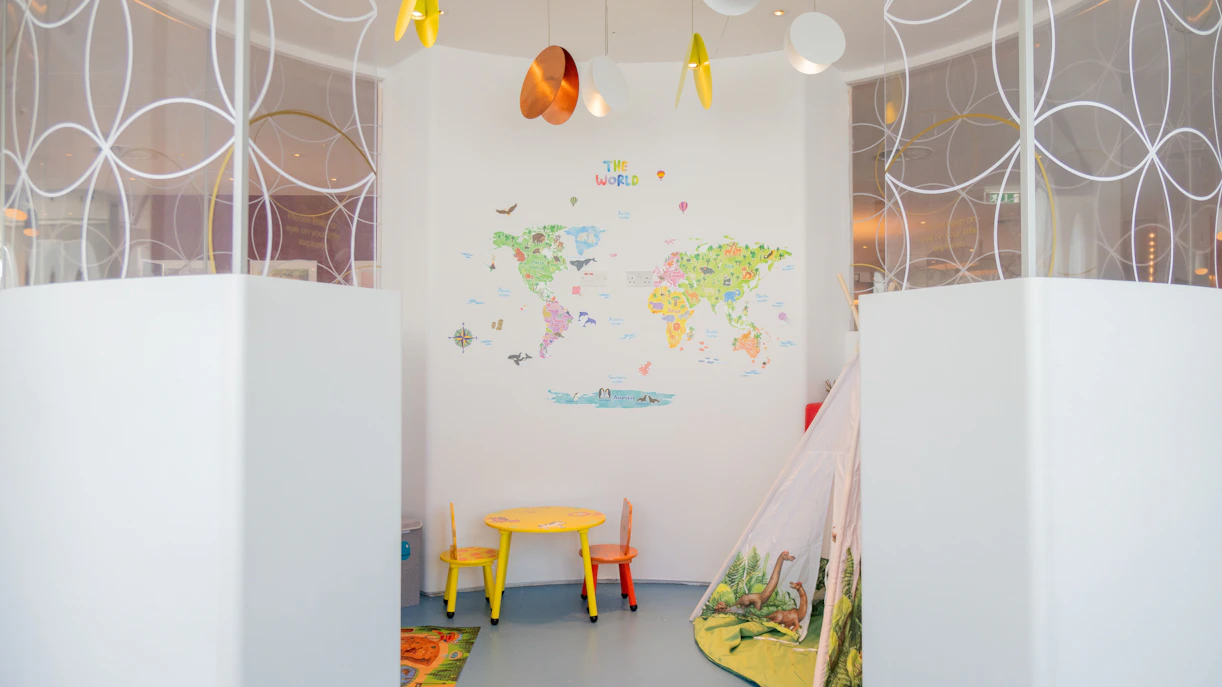 Kids play area with map wall and play tent, Plaza Express, Plaza Premium Lounge, London Gatwick Airport.