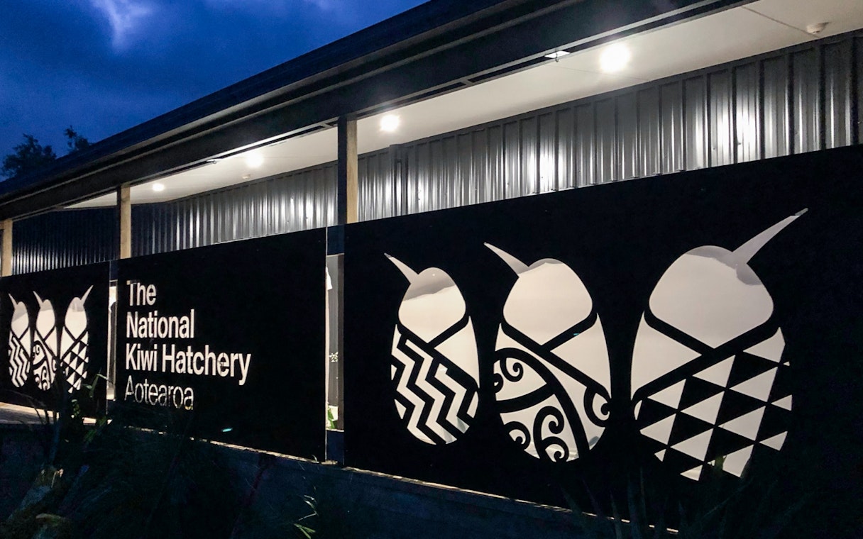 Exterior view of The National Kiwi Hatchery Aotearoa with kiwi bird designs.