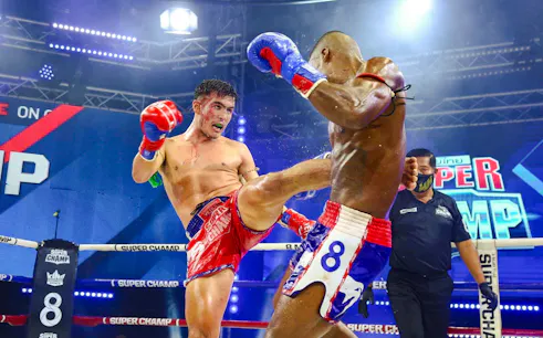 Muay Thai fighters in action at Patong Boxing Stadium, Phuket.