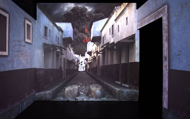 Street view of ancient Pompeii with volcanic eruption in the background at the virtual museum.