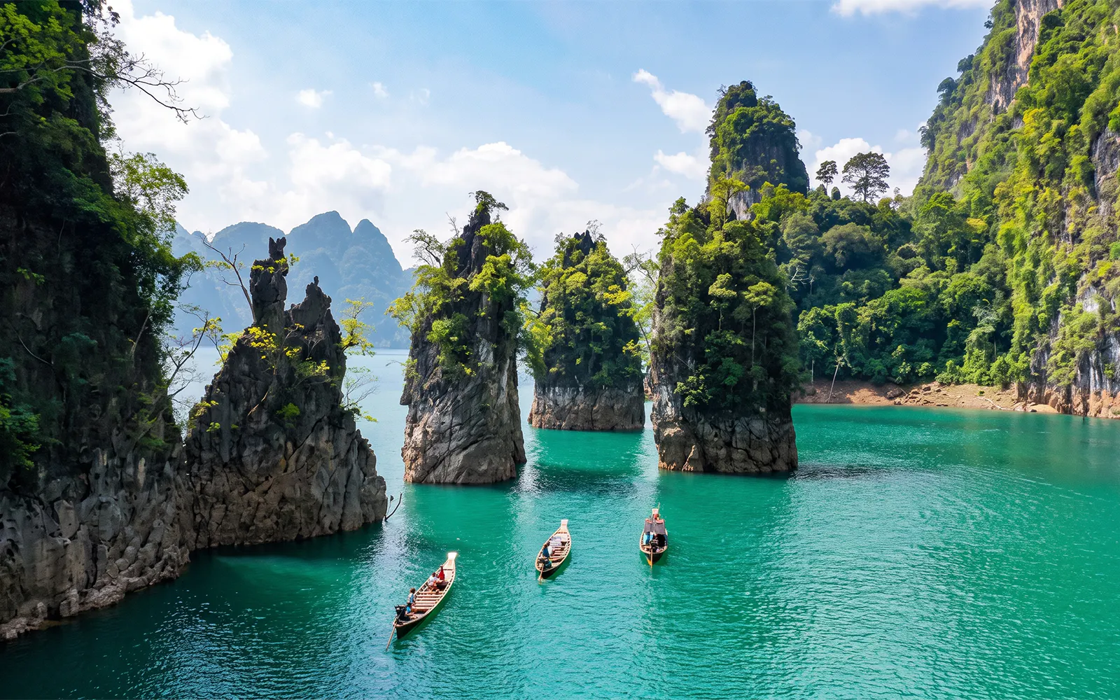 From Krabi: Cheow Lan Lake Boat Tour, Jungle Hike, Diamond Cave, and Floating Restaurant Lunch Guided Tour