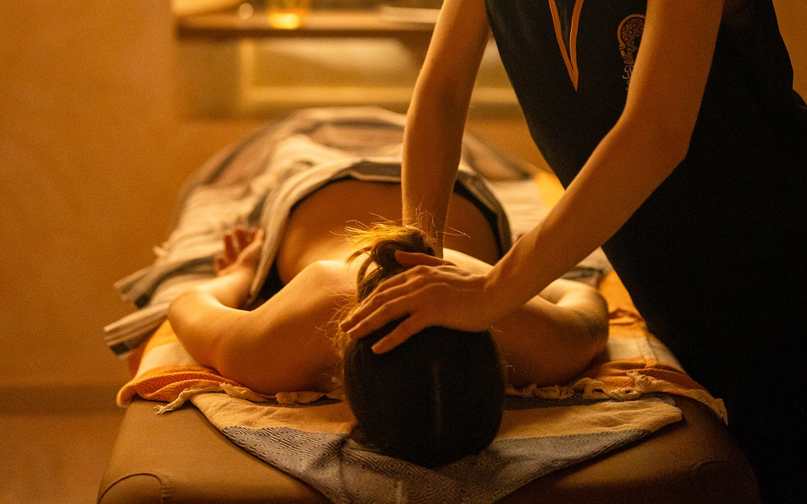 Visitors receiving a Traditional Hammam massage in Granada spa.