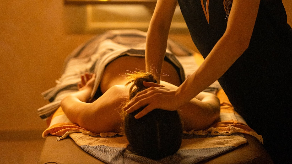 Visitors receiving a Traditional Hammam massage in Granada spa.