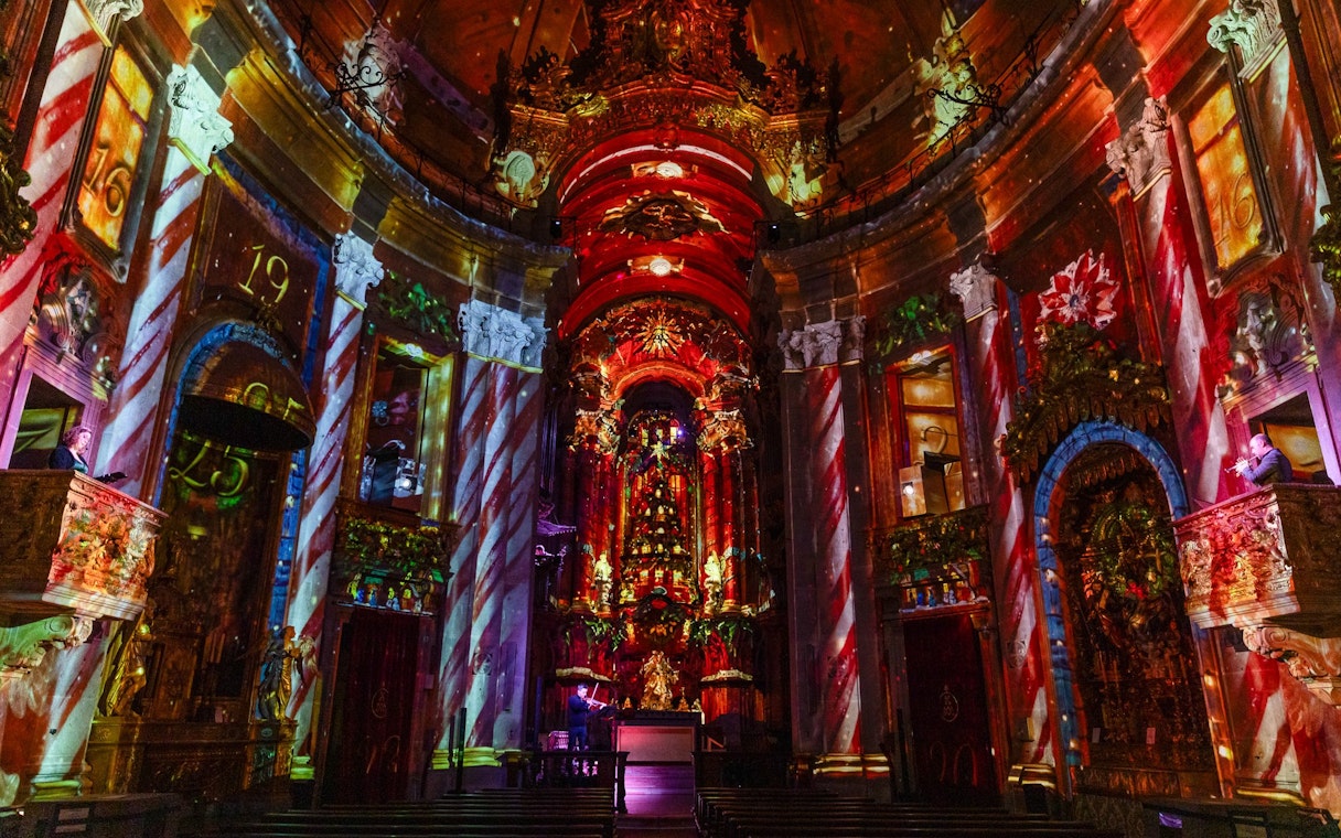 Light projections inside Clérigos Church during the Spiritus show in Porto.