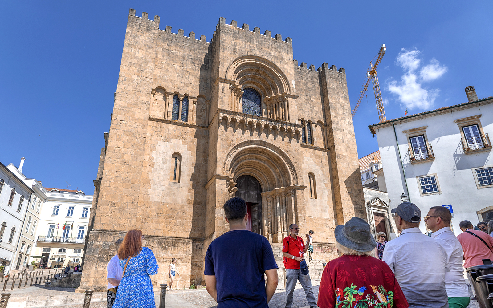 Tour group at the Old Cathedral of Coimbra during Fátima & Coimbra full-day tour from Porto.