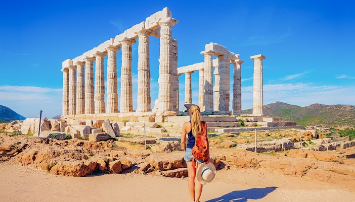 Guests exploring Temple of Poseidon