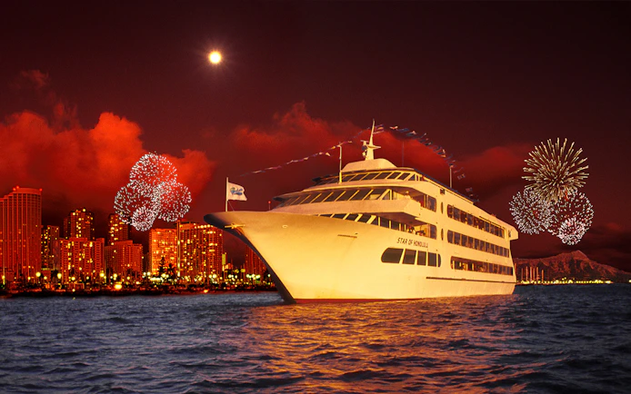 Cruise ship near Honolulu skyline with fireworks in Hawaii.