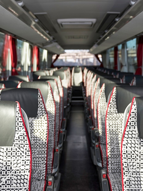Interior of SIT shuttle bus from Ciampino Airport to Roma Termini, showing patterned seats.
