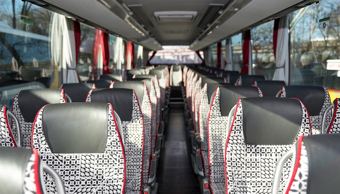 Interior of SIT shuttle bus from Ciampino Airport to Roma Termini, showing patterned seats.