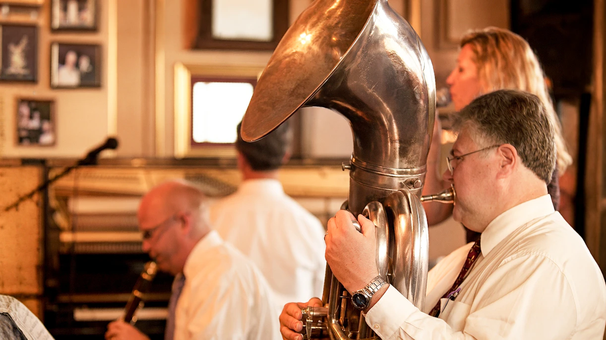 Musicians playing jazz instruments on the Riverboat City of New Orleans brunch cruise.