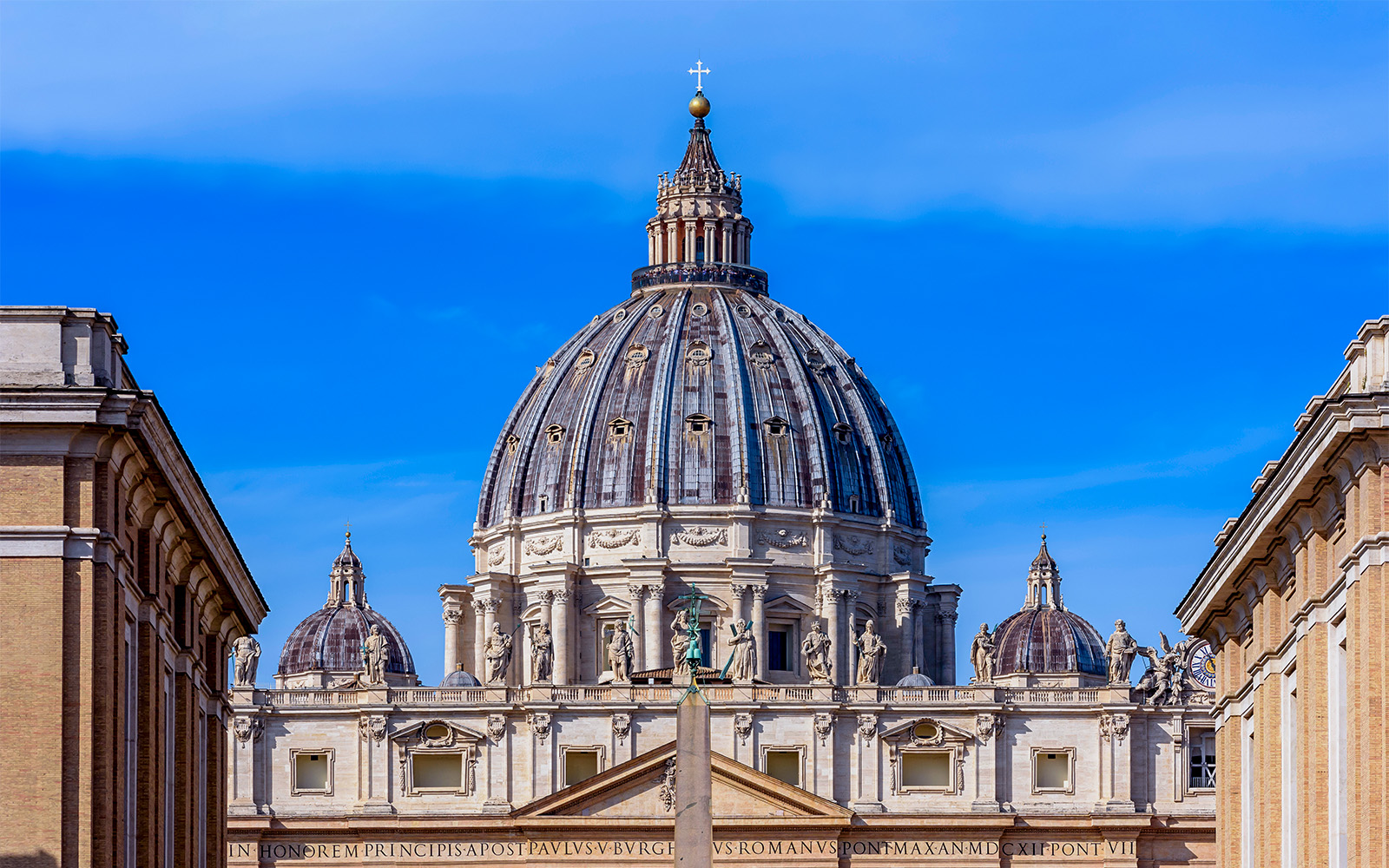 Vatican grottoes beneath St. Peter's Basilica, showcasing ancient tombs and religious artifacts.