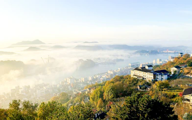 Sunset view from Mt. Senkoji Ropeway overlooking Onomichi city and Seto Inland Sea, Hiroshima, Japan.
