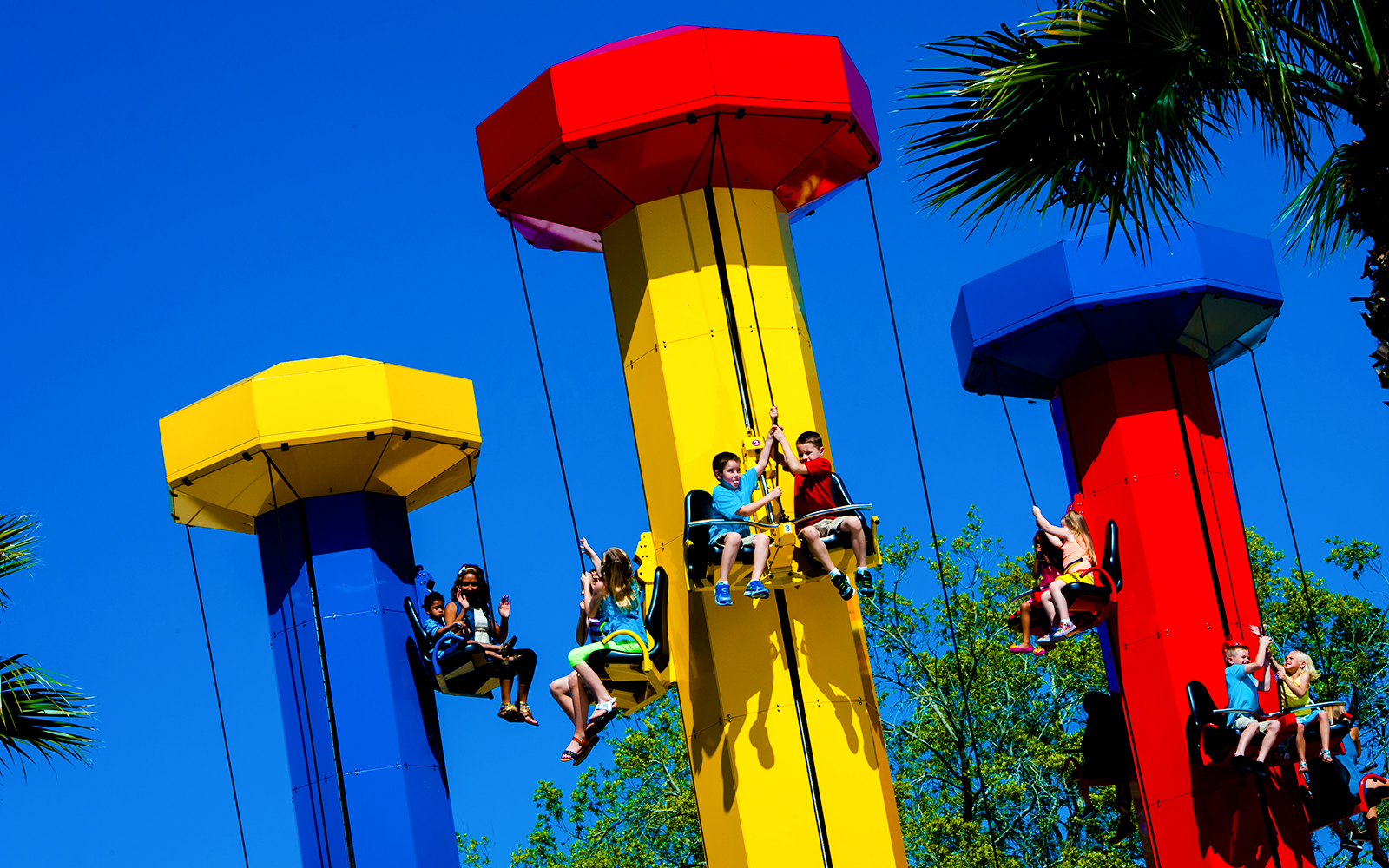 Children enjoying the Kid Power Tower ride at Legoland Florida.