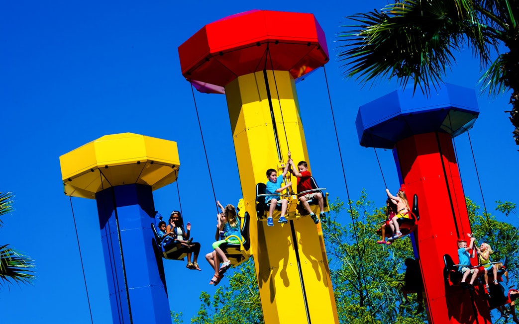 Children enjoying the Kid Power Tower ride at Legoland Florida.