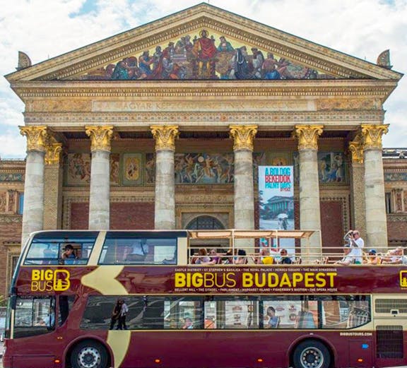 Open-top Big Bus Budapest in front of the Hungarian Art Museum.
