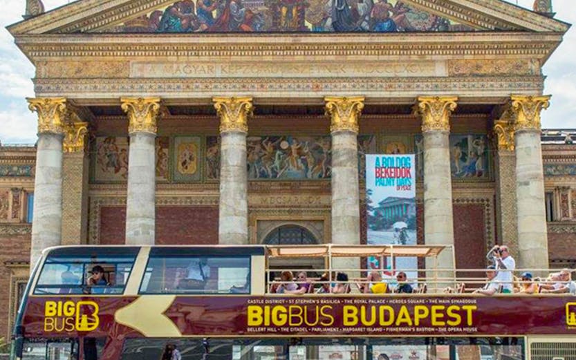 Open-top Big Bus Budapest in front of the Hungarian Art Museum.