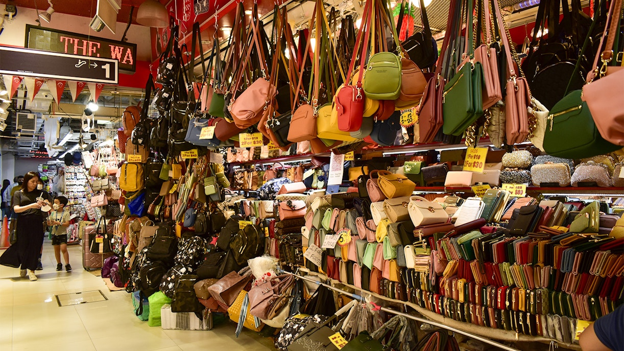 Bugis Street Market in Singapore bustling with shoppers and vibrant street stalls.