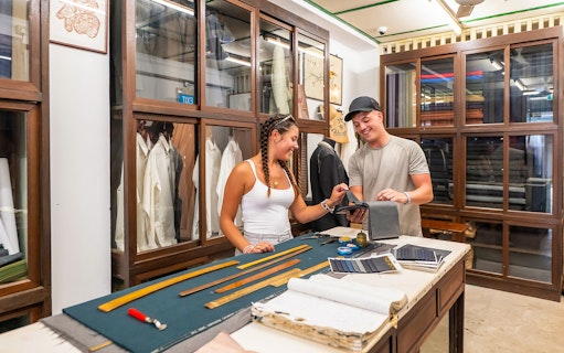 Visitors exploring Shophouse Living exhibit at Chinatown Heritage Centre.