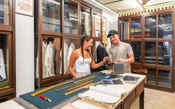 Visitors exploring Shophouse Living exhibit at Chinatown Heritage Centre.