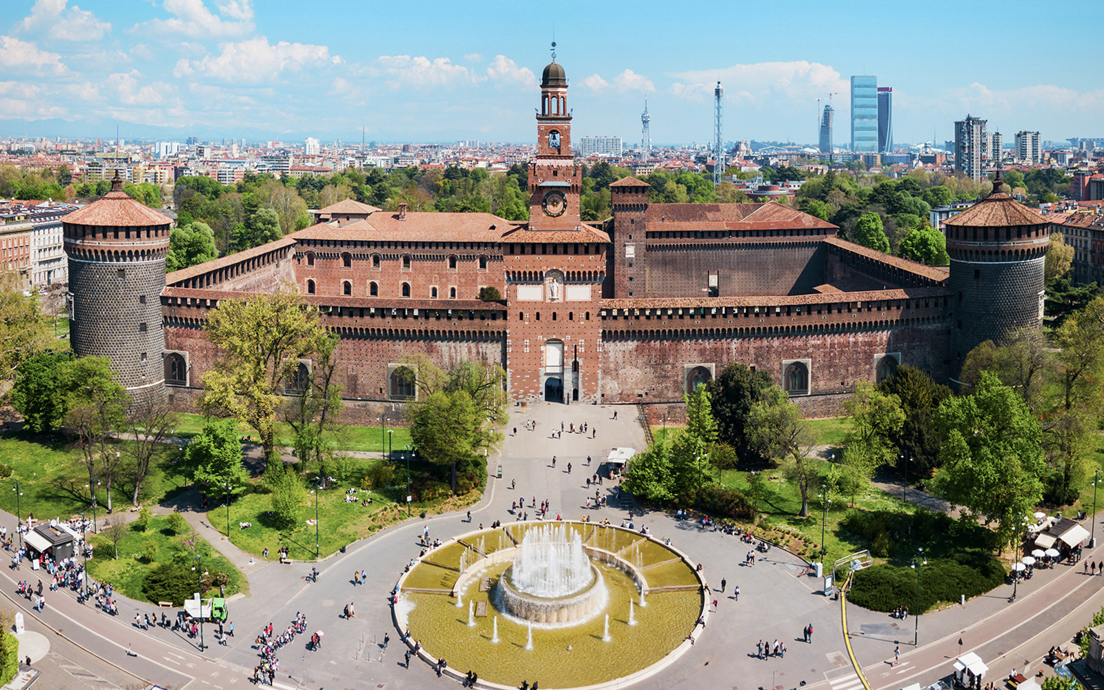 Aerial view of Sforza Castle in Milan with surrounding park and fountain.