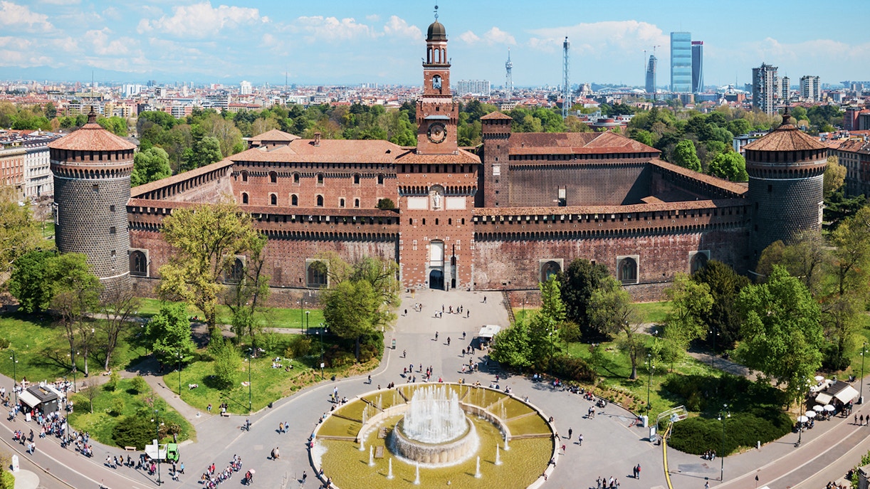 Aerial view of Sforza Castle in Milan with surrounding park and fountain.