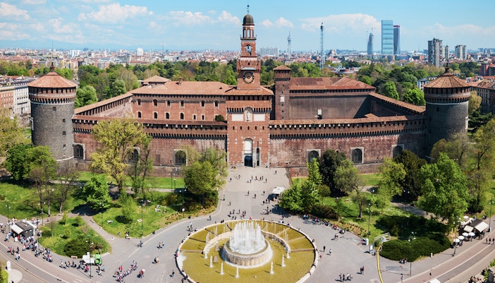 Aerial view of Sforza Castle in Milan with surrounding park and fountain.
