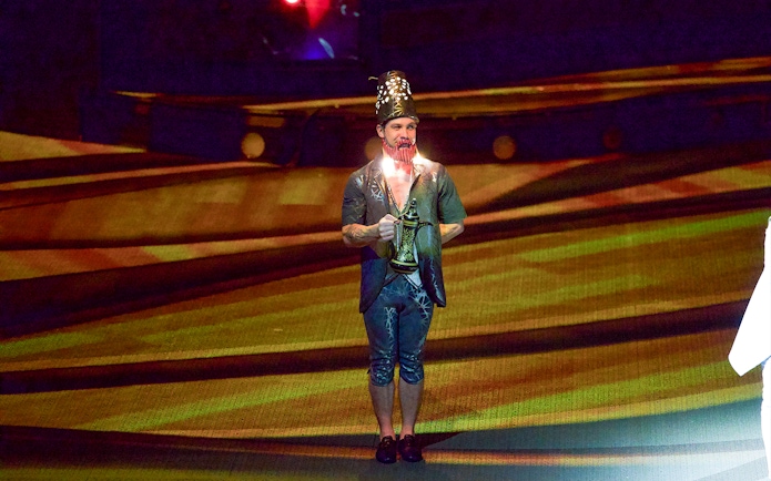 Performer on stage at La Perle by Dragone show in Dubai.