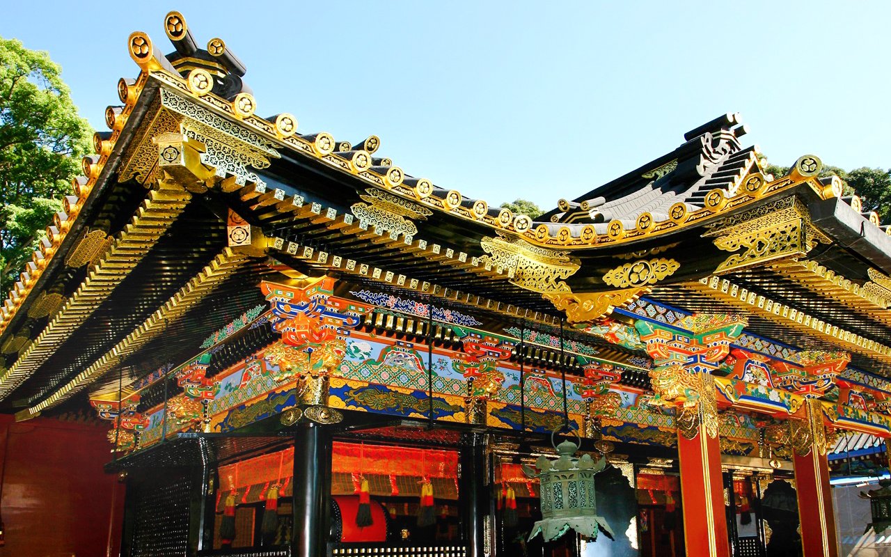 Nikko Toshogu Shrine ornate roof with gold and colorful carvings in Japan.