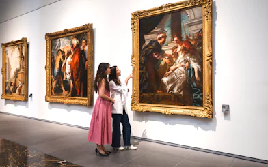 Women viewing "The Education of the Virgin" by Rubens at Louvre Abu Dhabi.