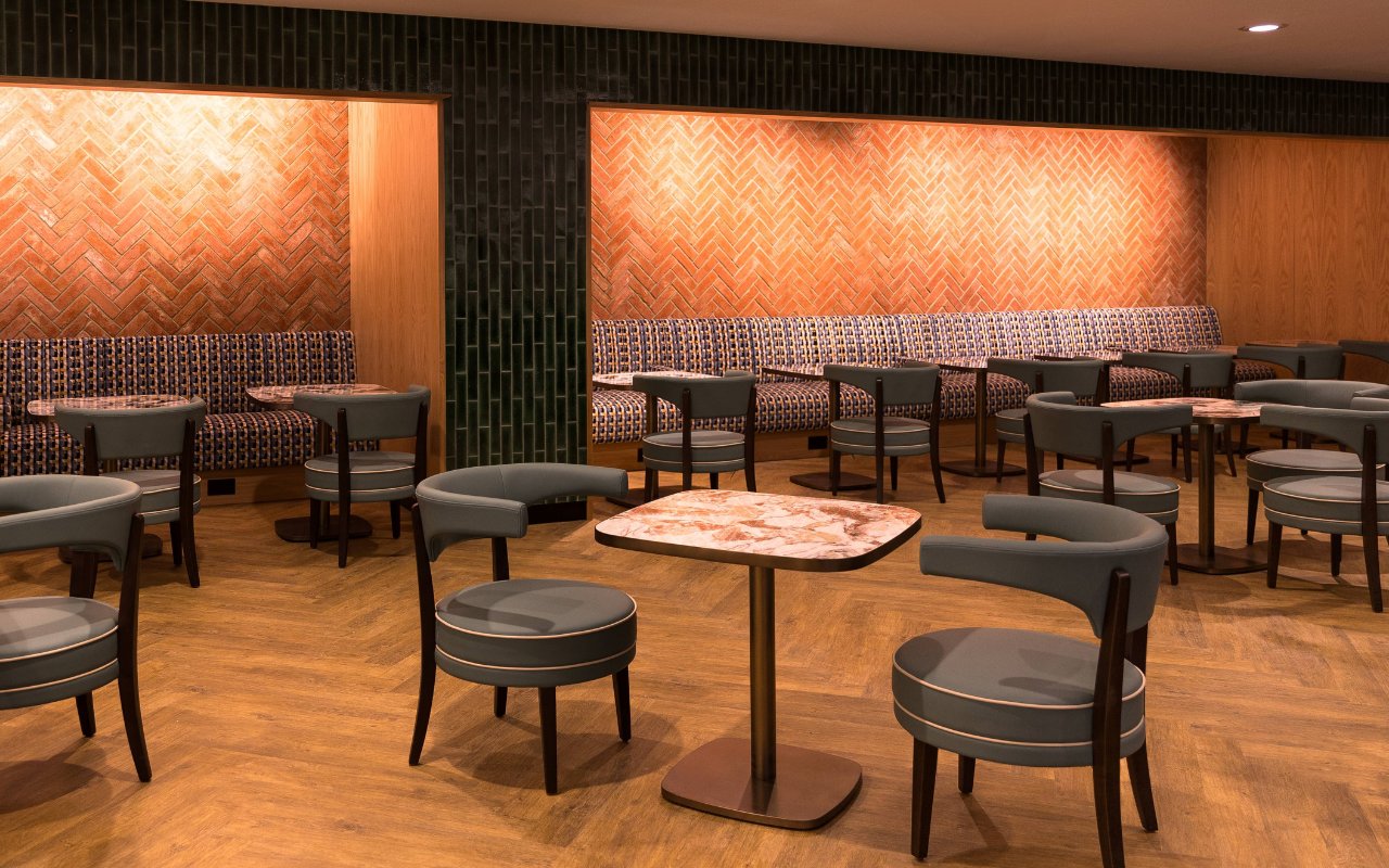 Seating area at Plaza Premium Lounge, Terminal 4, London Heathrow Airport.