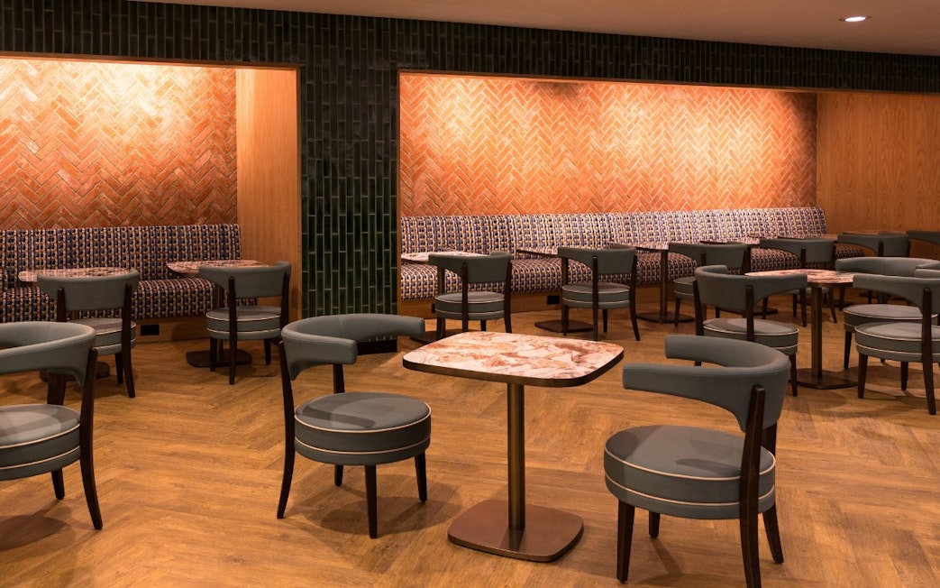 Seating area at Plaza Premium Lounge, Terminal 4, London Heathrow Airport.