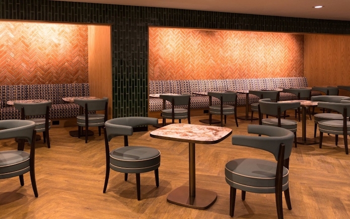 Seating area at Plaza Premium Lounge, Terminal 4, London Heathrow Airport.