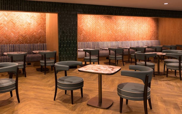 Seating area at Plaza Premium Lounge, Terminal 4, London Heathrow Airport.