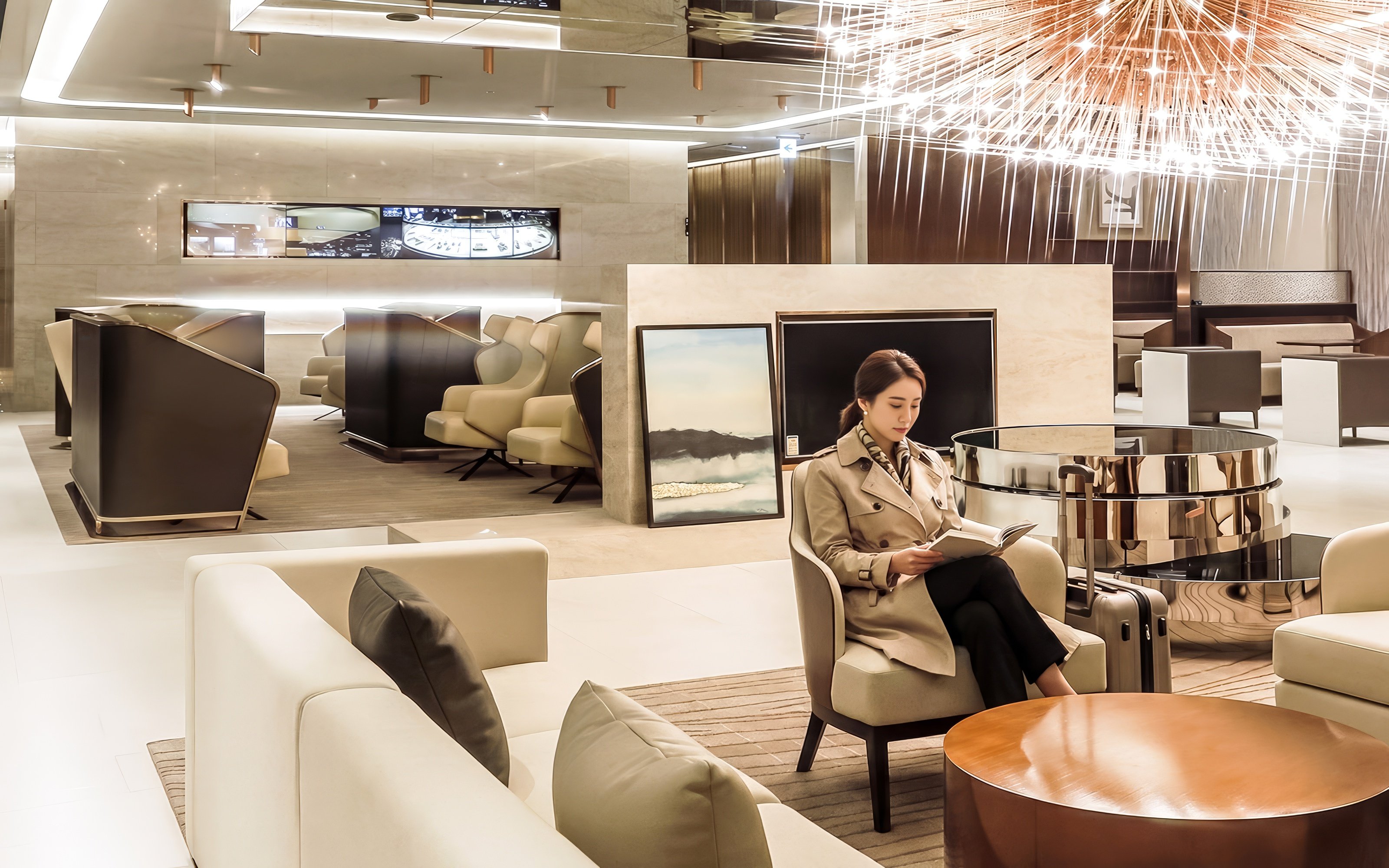 Traveler reading in Matina Gold lounge, Terminal 2, Incheon International Airport.