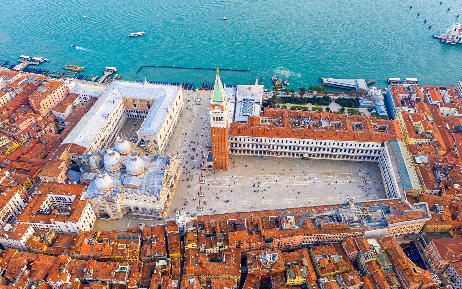 Aerial view of San Marco Square and Basilica of Saint Mark during a helicopter tour in Venice.