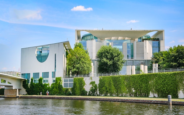 Federal Chancellery in Berlin by the Spree River with modern architecture.