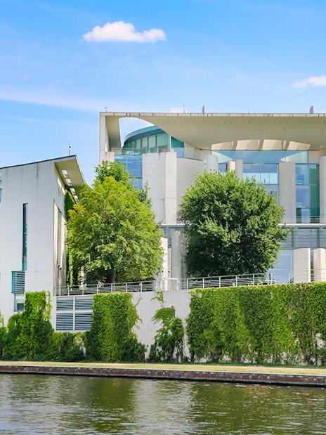 Federal Chancellery in Berlin by the Spree River with modern architecture.