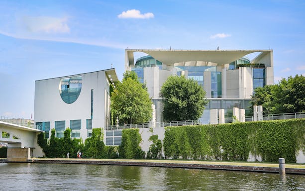 Federal Chancellery in Berlin by the Spree River with modern architecture.