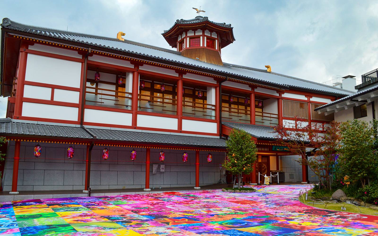 Oedo-Onsen-Monogatari traditional Japanese bathhouse with people enjoying hot spring baths.